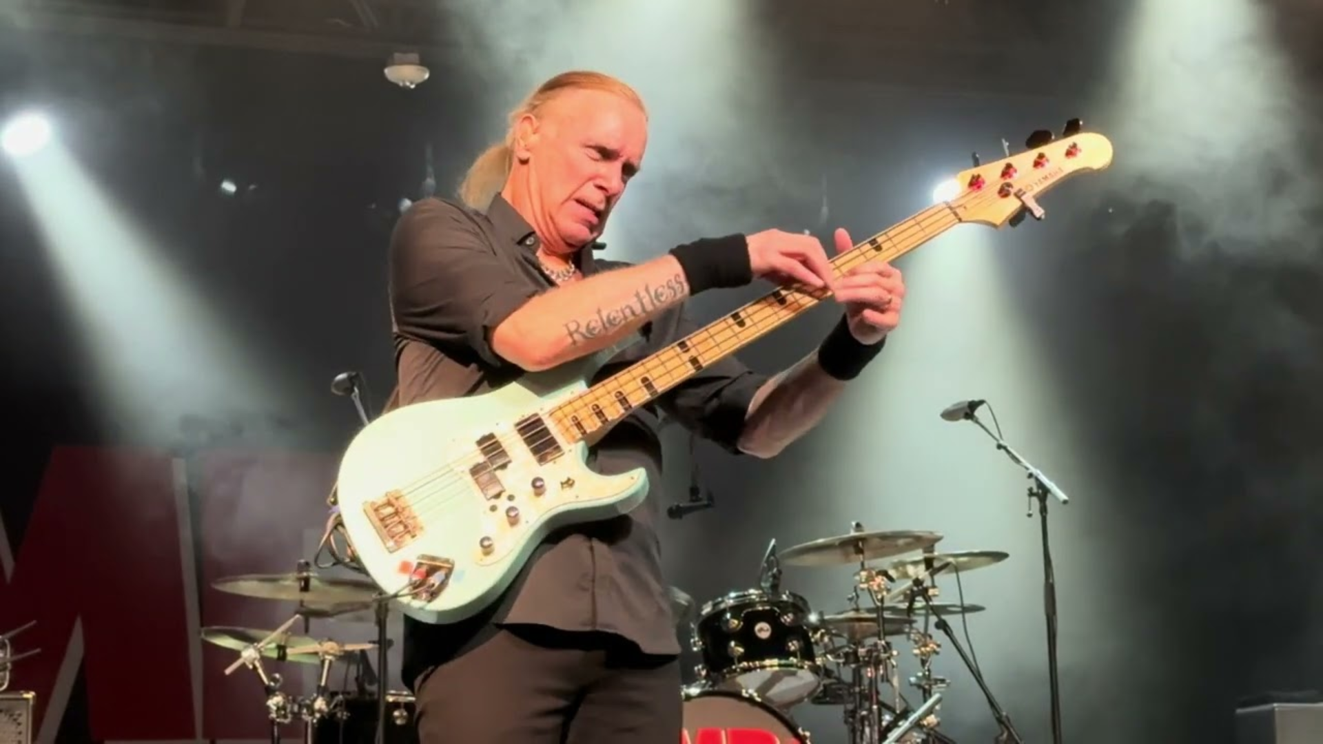 Billy Sheehan playing bass on stage