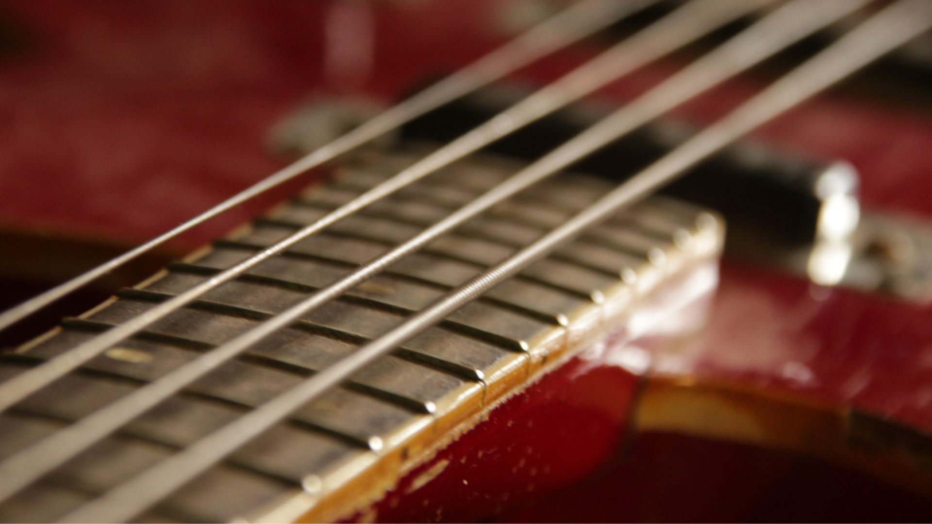 Close up of bass guitar strings